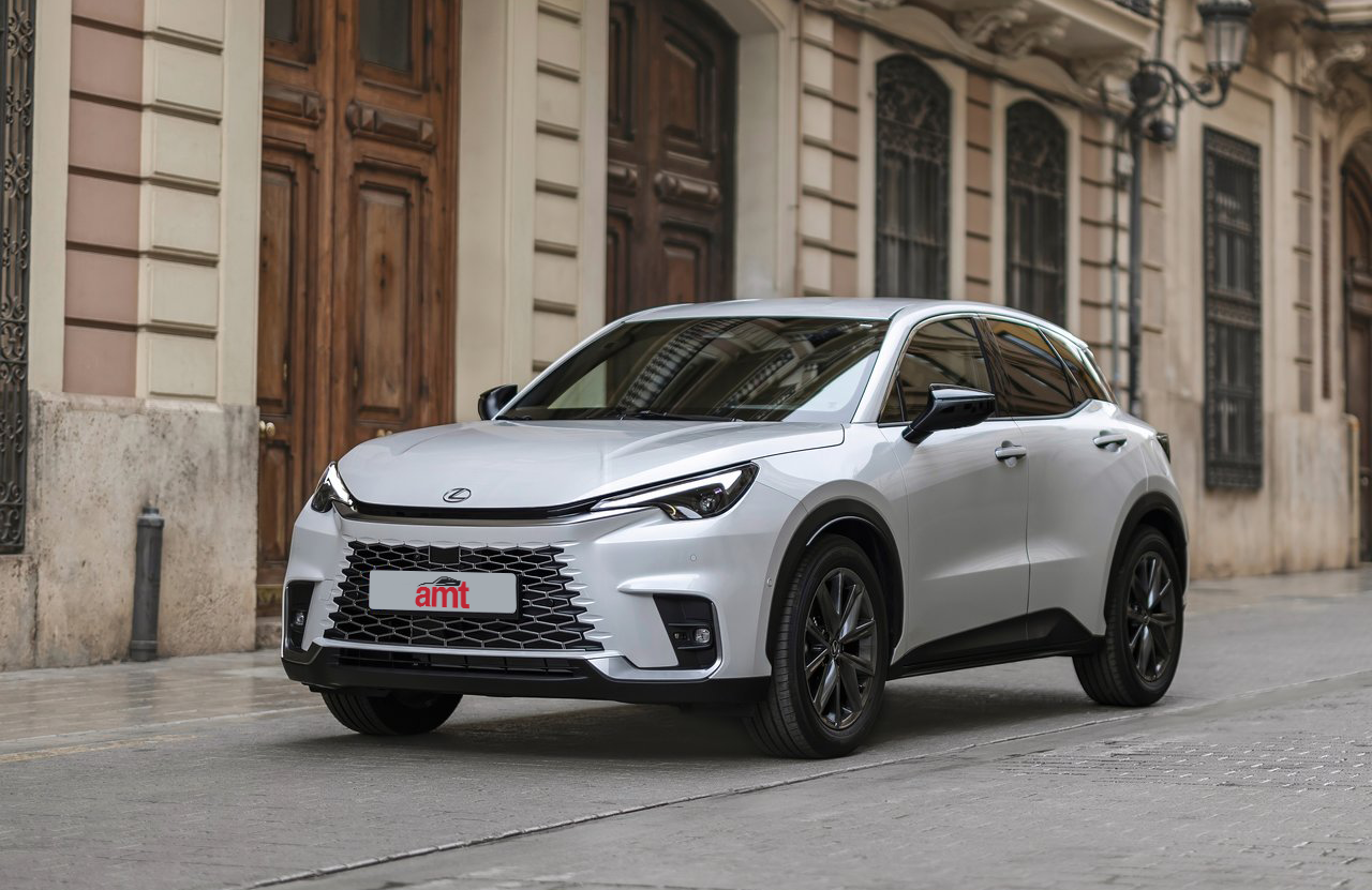 Silver Lexus LBX SUV parked in the city, highlighting affordable leasing options.