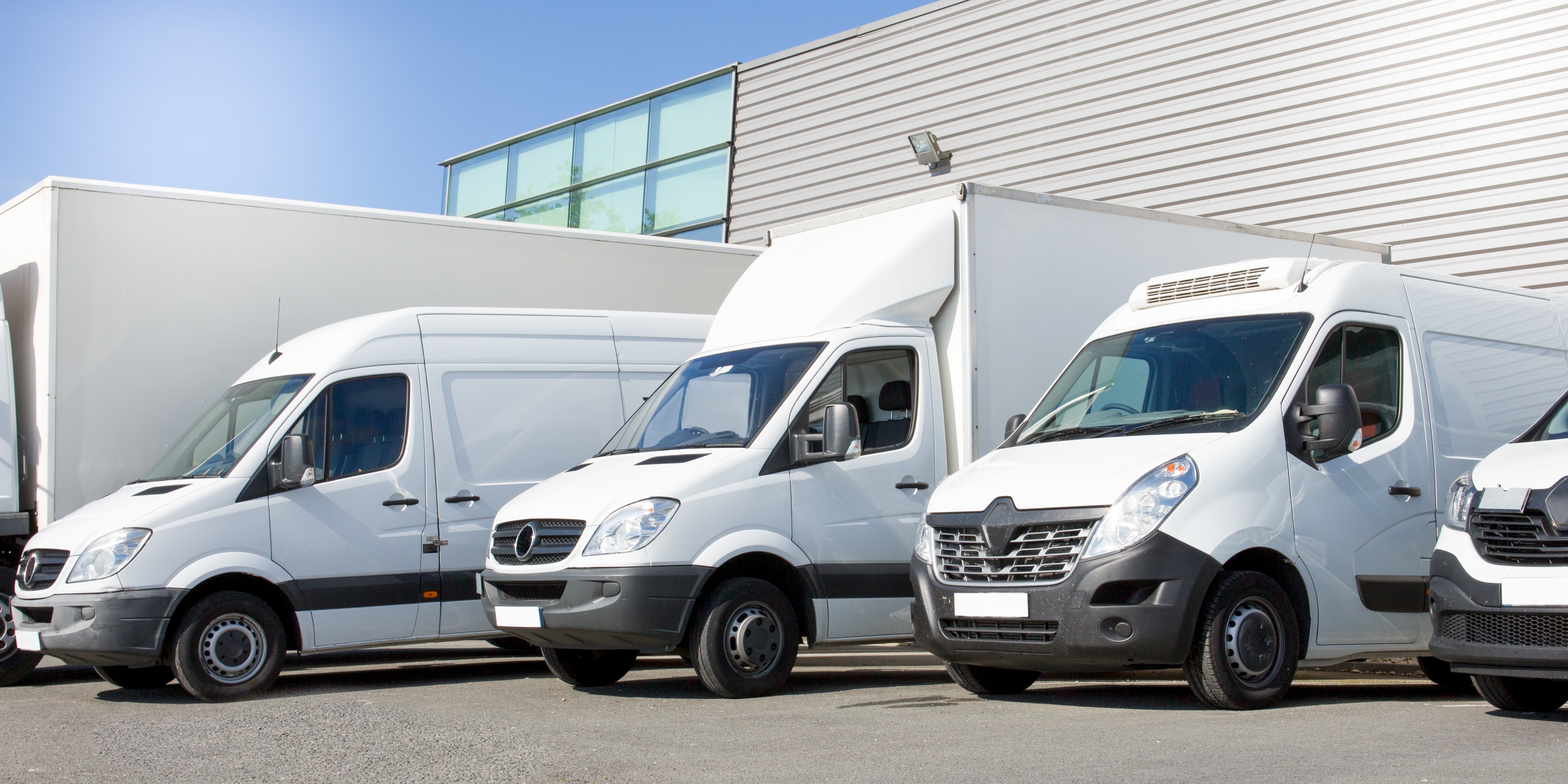 An image of a fleet of different vans