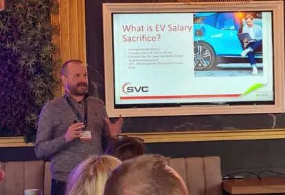 An image showing David Moffatt, sales manager from Stable Vehicle Contracts, explaining to an audience the benefits of the salary sacrifice car scheme