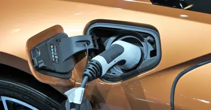 An image of an electric car being charged