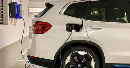 An image showing an electric car charging
