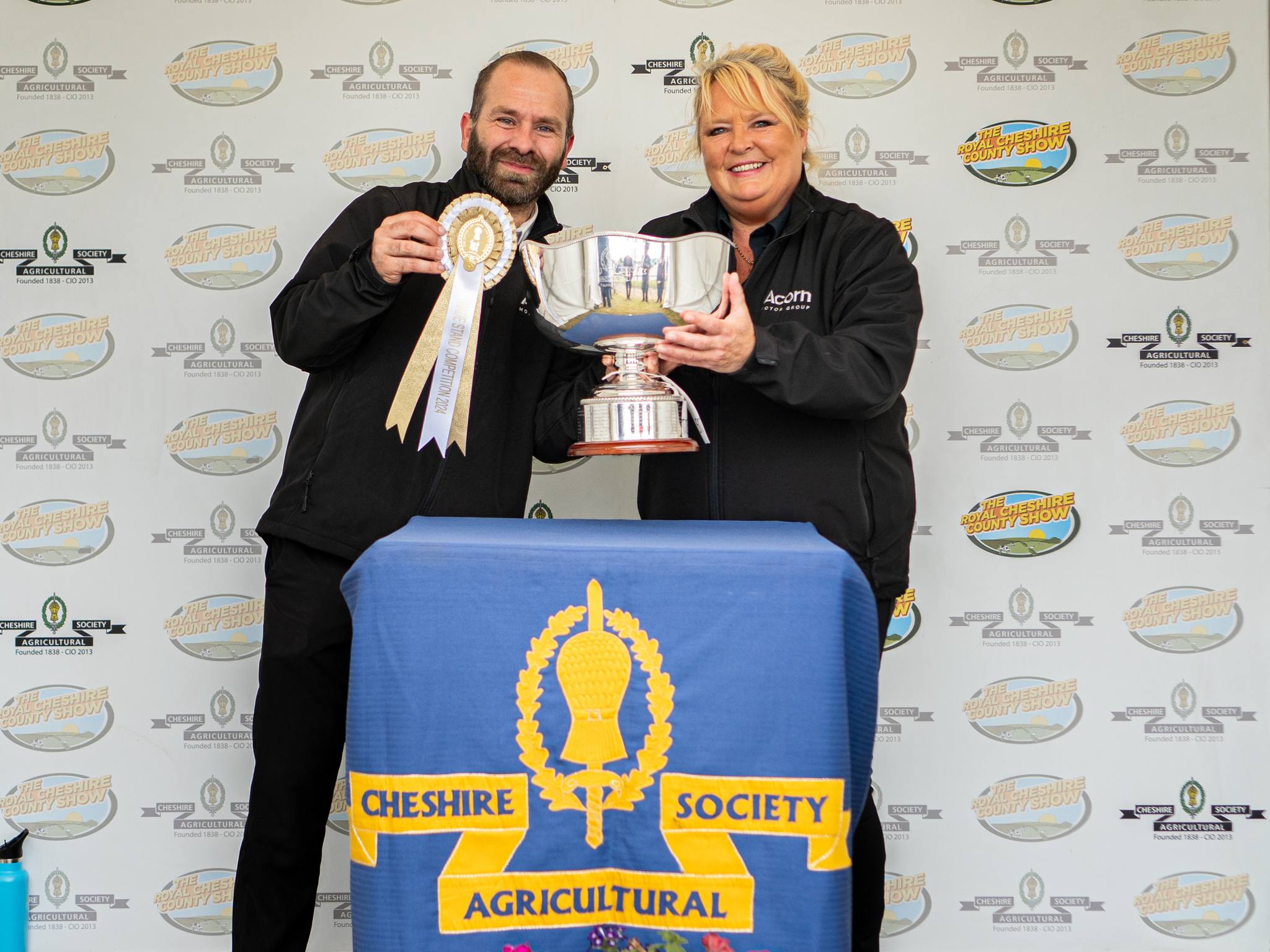 Amanda Buckley Group CRM Manager collecting the award for best stand