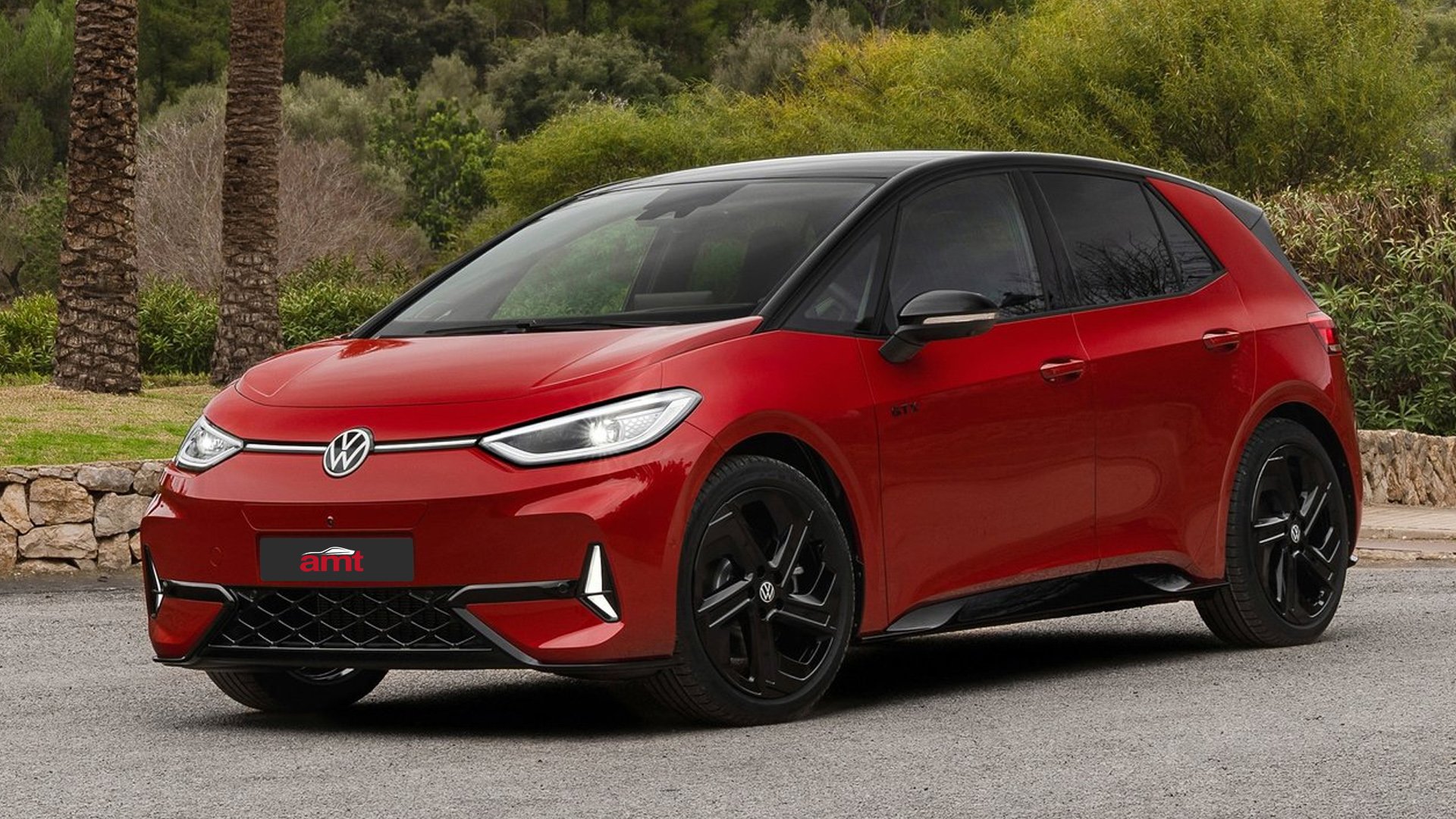 Front-side view of a red Volkswagen ID.3 GTX parked outdoors with black alloy wheels and AMT number plate.