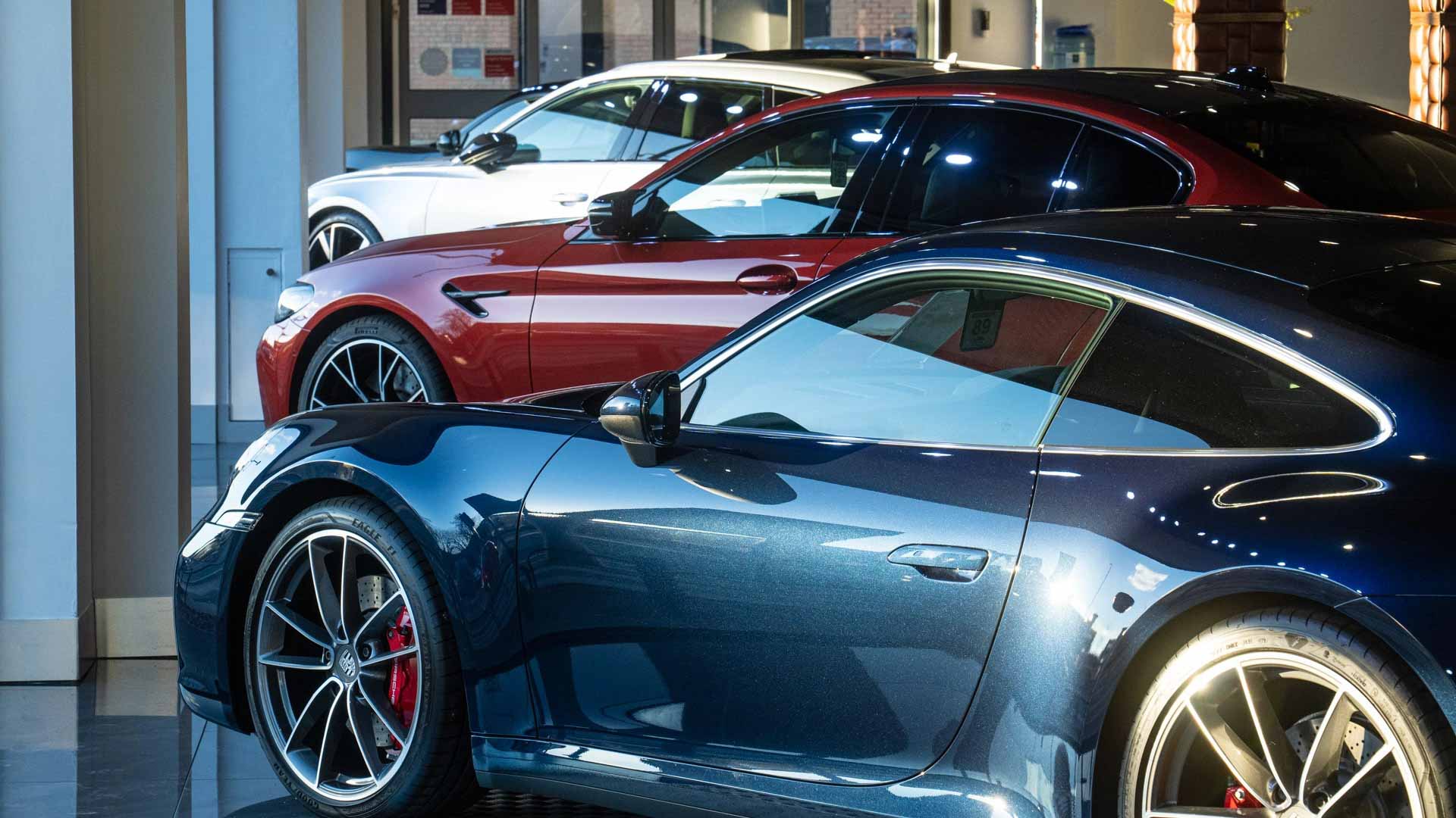 Multiple luxury vehicles showcasing luxury car leasing services from AMT Auto Lease