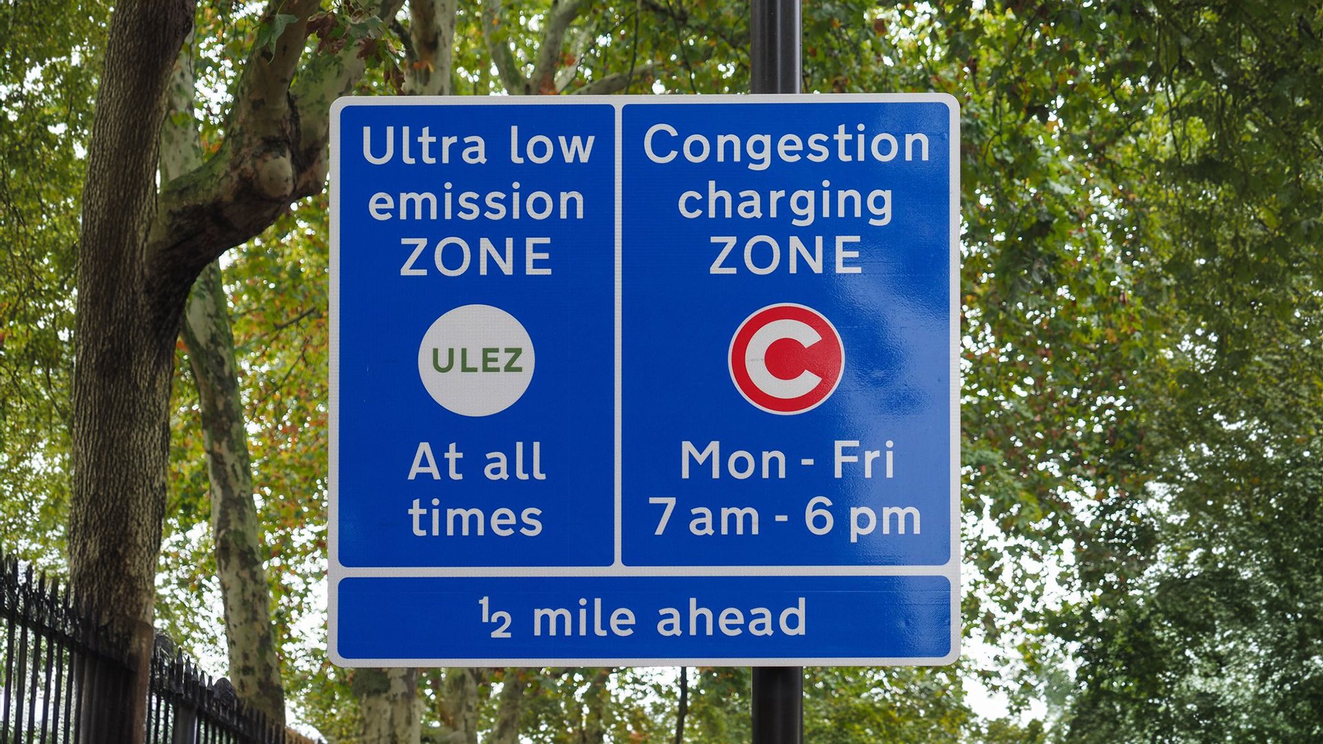 Road sign showing emission and congestion zones – helpful when taking your car abroad.