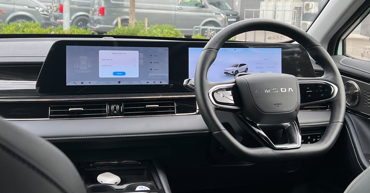 An image showing a 2024 Omoda E5 SUV interior dashboard and steering wheel